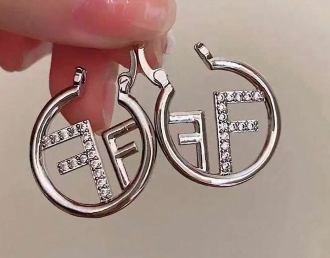 Lustrous Gold Logo Hoops