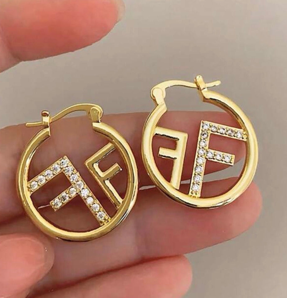 Lustrous Gold Logo Hoops