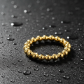 The Golden Sphere Eternity Band